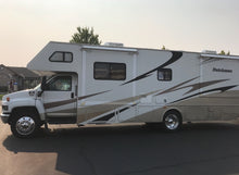 Load image into Gallery viewer, Dutchmen Class A Motorhome Riding on Polished Alcoa 22.5 inch wheels